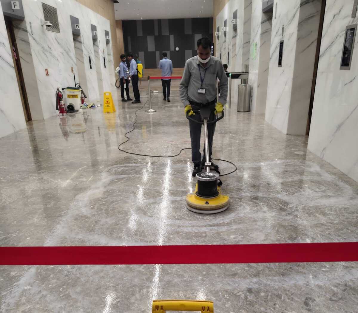 Polishing crew on-site at a corporate office